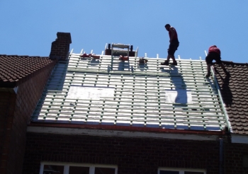 Réfexion d'une toiture à la rue Vander Elst