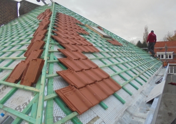 Rénovation d'une toiture à Lange Wagenstraat