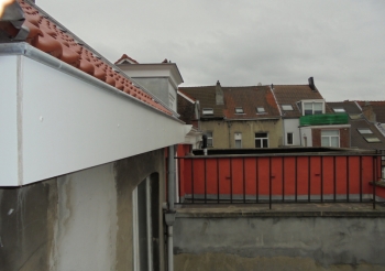 Rénovation d'une toiture en tuiles rue de la Besace