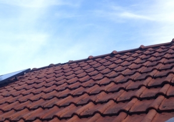 Réfexion d'une toiture à la rue Vander Elst