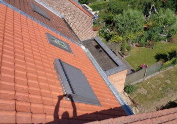 Réfexion d'une toiture à la rue Vander Elst